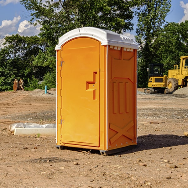 what is the cost difference between standard and deluxe portable restroom rentals in Broadlands